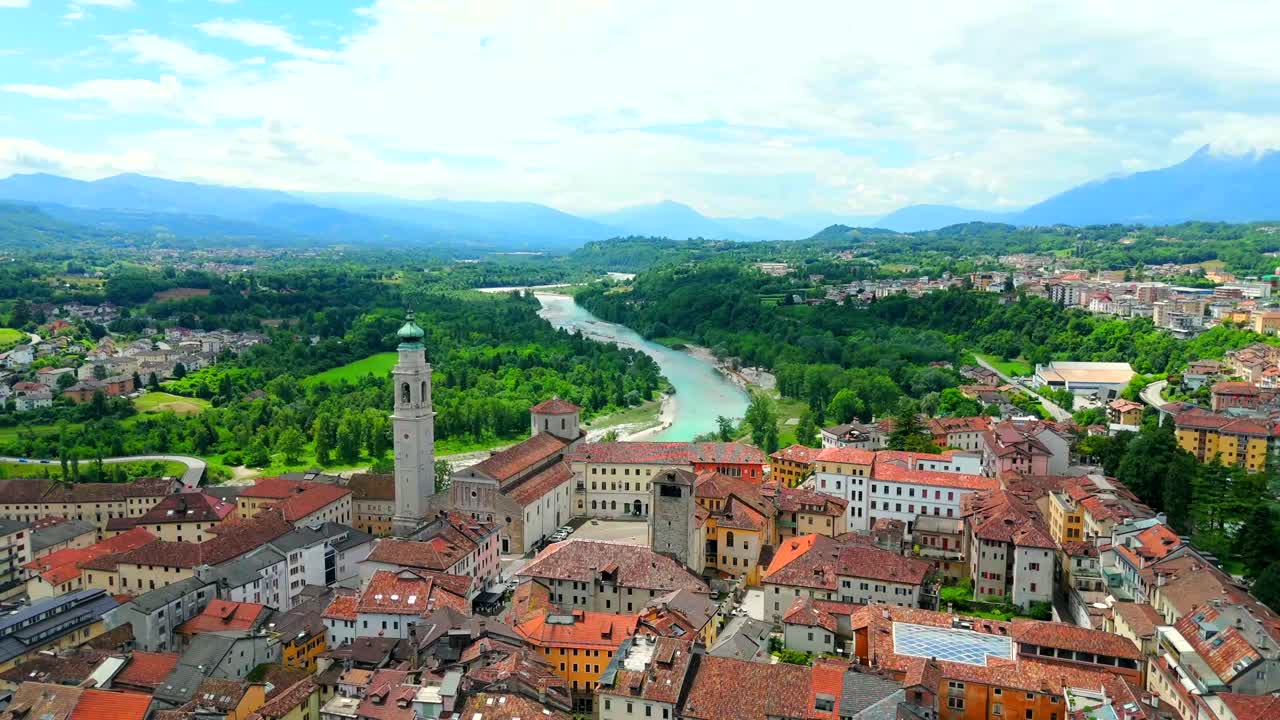 From above, discover the hidden gems of Belluno, including quaint piazzas and ancient churches that tell the story of this enchanting Italian town.