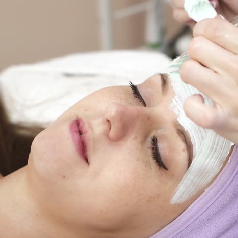 woman with cosmetic mask