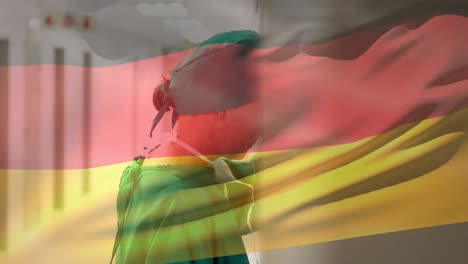 animación de la bandera alemana con un trabajador de la salud en el fondo durante el virus del coronavirus