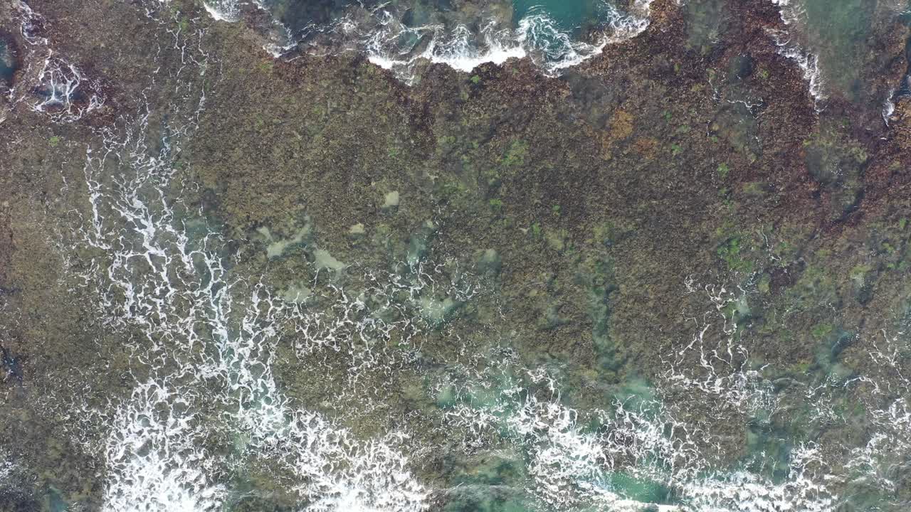 Aerial View of Coastal Rocks and Waves