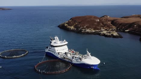 drone shot of a fish farming well-boat near the outer hebrides