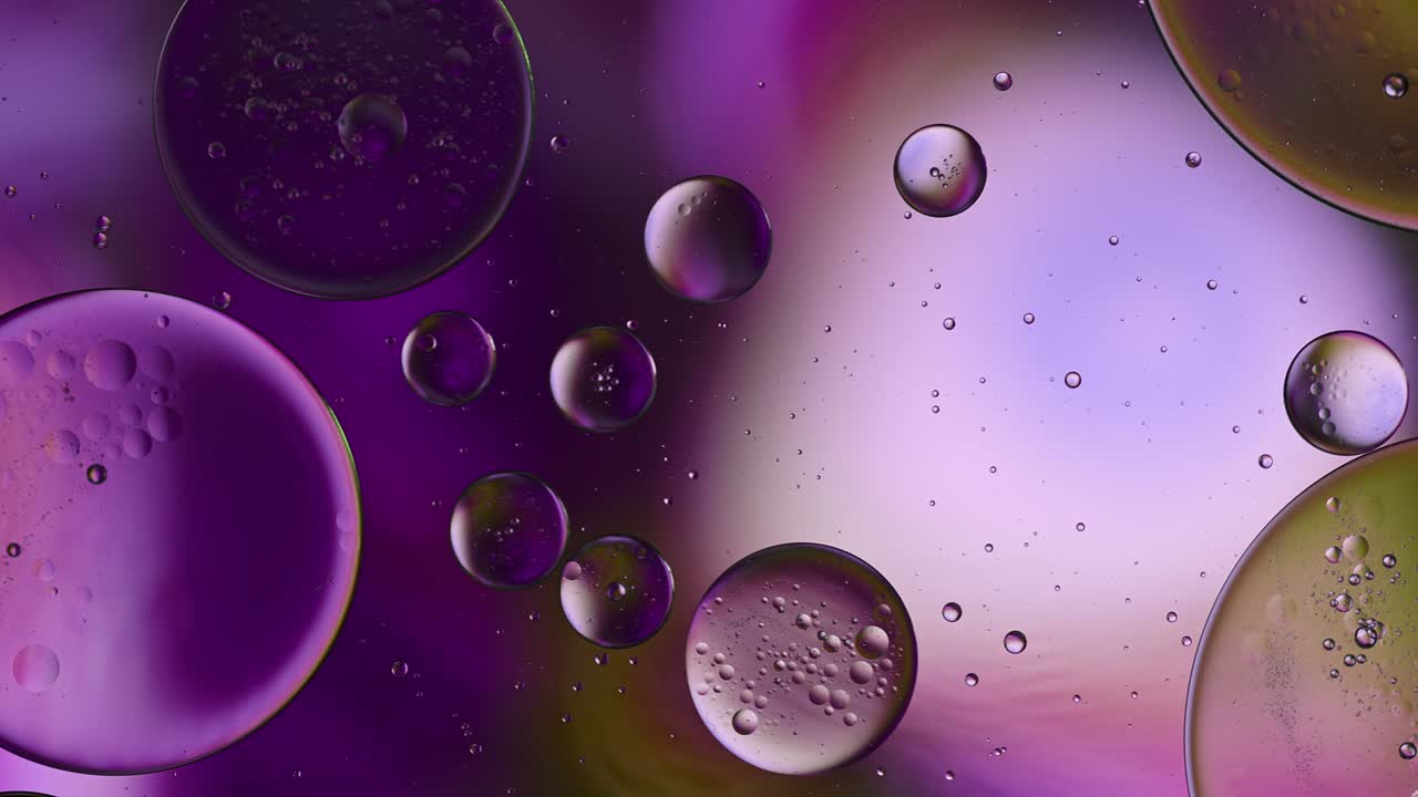 Abstract Colorful Food Oil Drops Bubbles and spheres Flowing