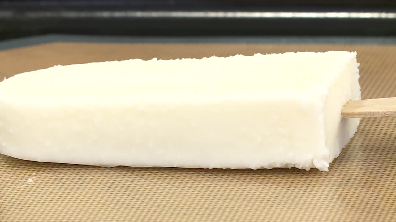 White Coconut Popsicle on a Baking Sheet