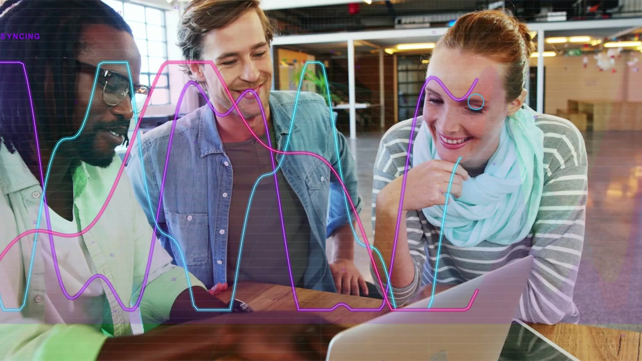 Left colleague gesturing at laptop, team reviewing business data, waveforms moving across screen