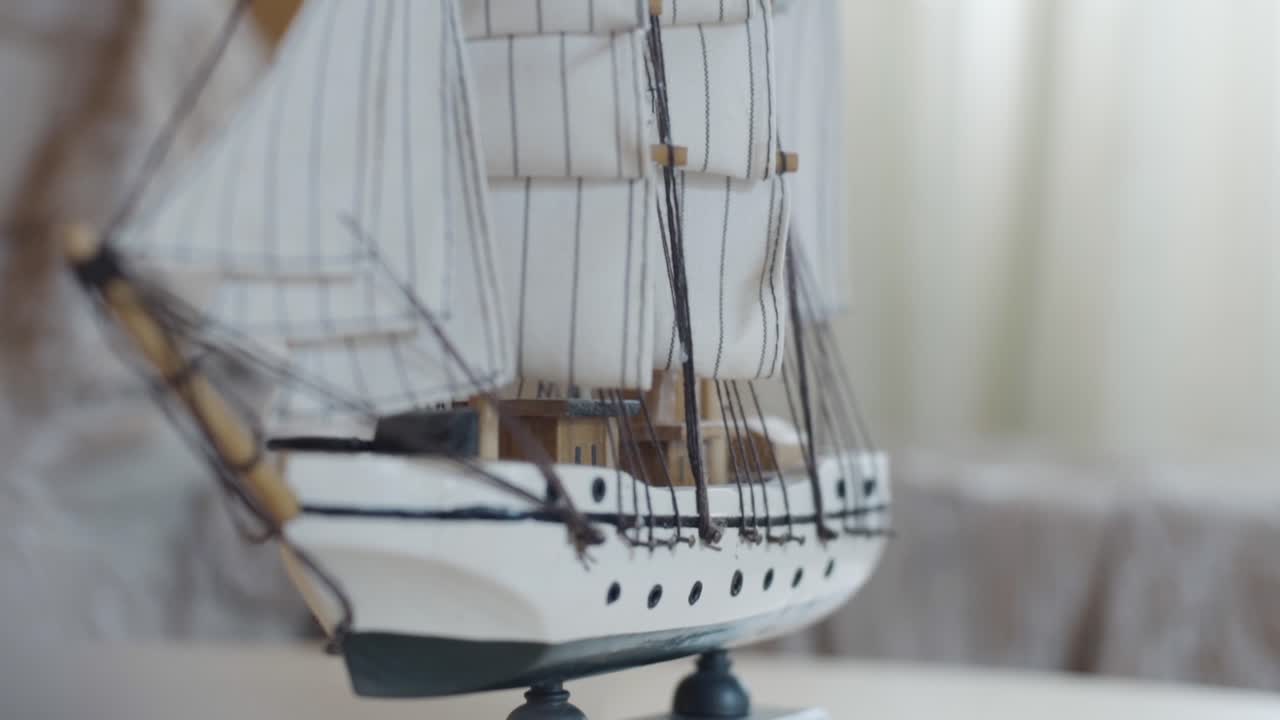 Close-up of a wooden model ship