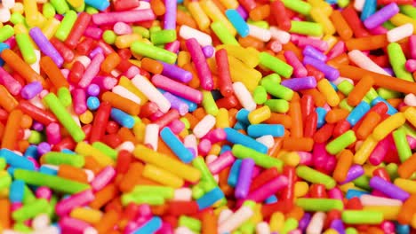 a dynamic close-up view of colorful sprinkles swirling in vibrant patterns.