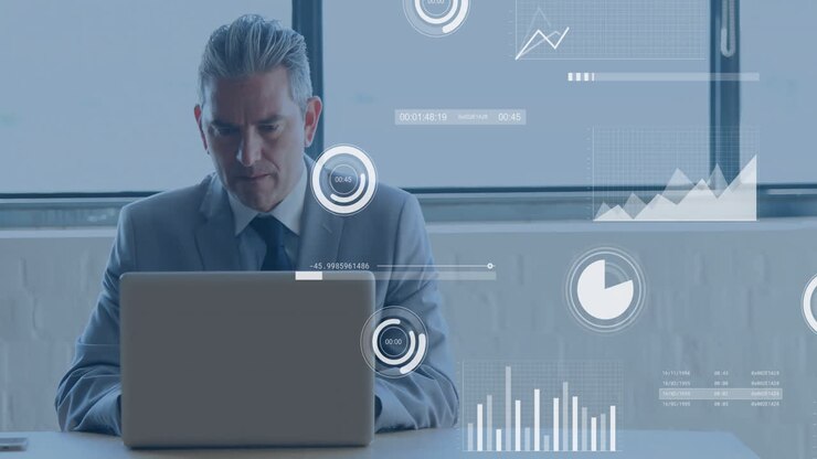 Animation of statistics and data processing over caucasian businessman using laptop in office