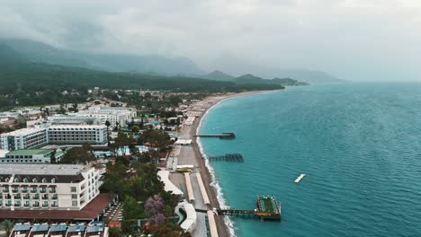 Drone-View-of-Kemer-City-of-Antalya,-Resort-Town-on-Mediterranean-Coast-of-Turkey