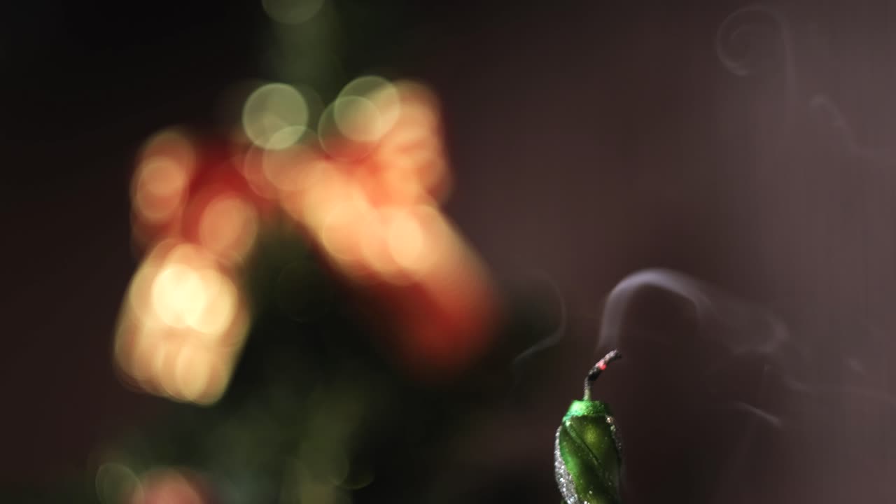 Burning Candle on Christmas Tree