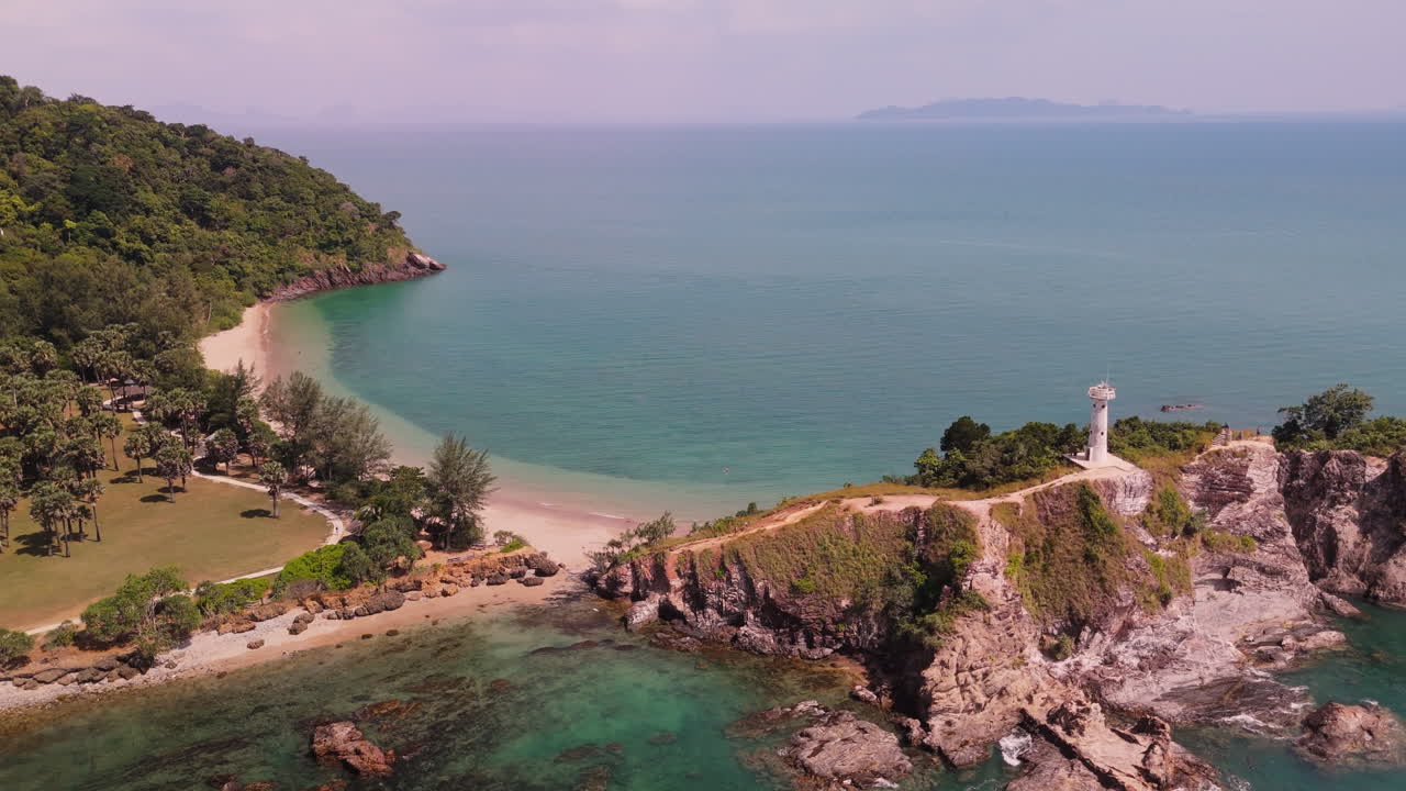 Aerial View of Tropical Island Beach with Lighthouse