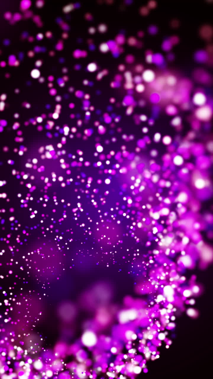 Pink purple dust particles explosion. Light glow beam effect. Loop animation. Vertical video.