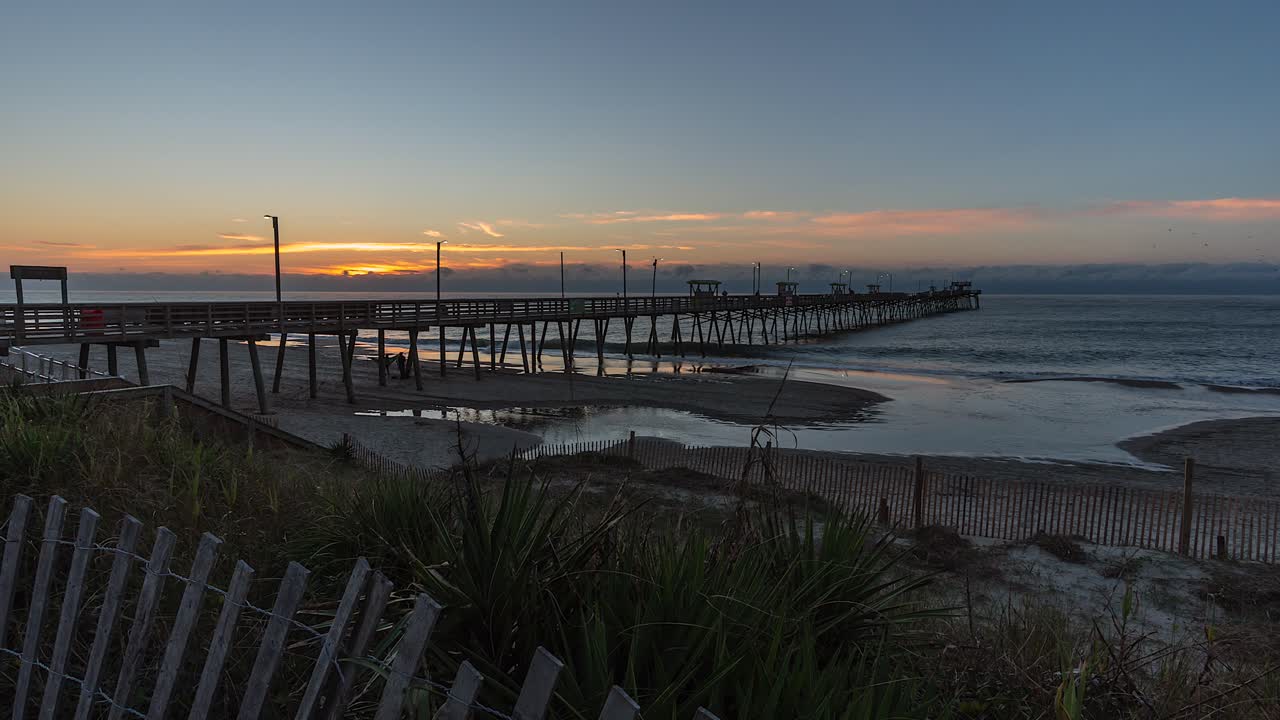 Timelapse Slider Shot of Bogue Inlet Fishing Pier at Sunrise - Emerald Isle, North Carolina
