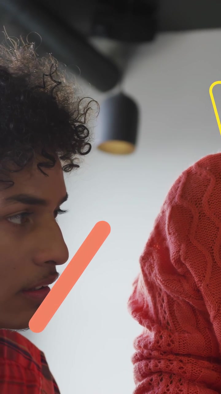Vertical video: Man listening in business chat, graphics circling face sweeping revealing pencils