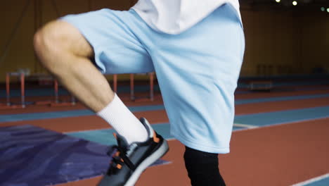 young man training indoors