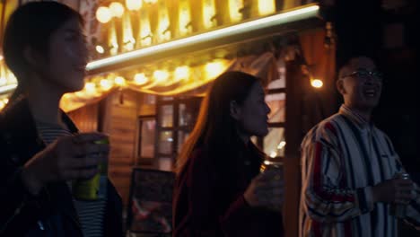 friends enjoying night out in japan