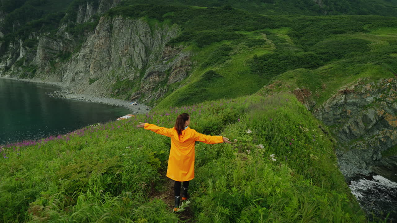 Woman Hiking on a Coastal Trail