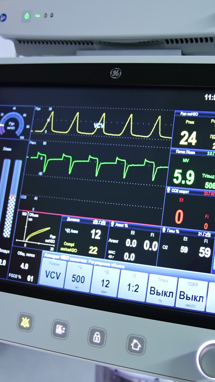 Unrecognized doctor's hand demonstrating the modern equipment in clinics. Black monitor working in the operational theatre. Close up. Vertical video
