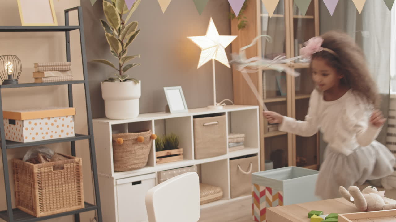 Little Mixed-Race Sisters Running Around Room