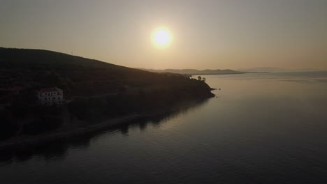 Aerial-landscape-with-green-upland-and-sea-at-sunset-Greece