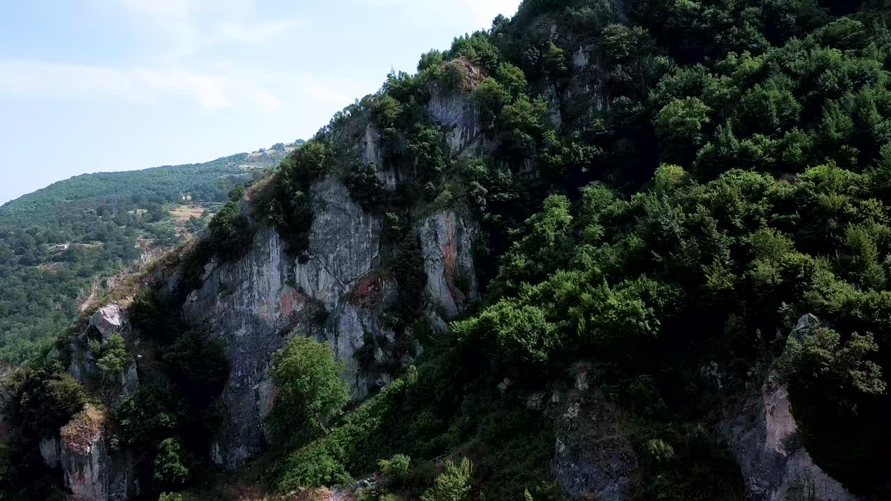 Restaurant with mountain view revealing scenery behind, Sant Angelo Le Fratte, low drone flyover