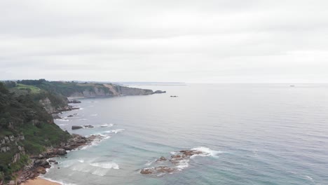 ascending aerial shot of a scenic coastline