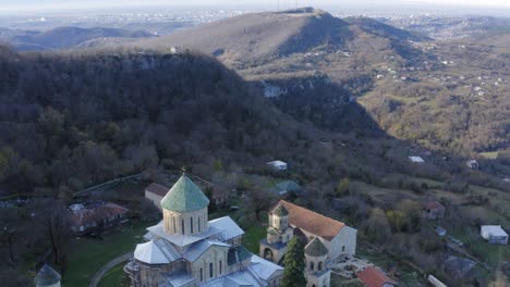 aerial of martvili monastery in between mountains in kutaisi georgia