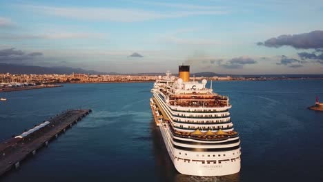 costa dacrema cruise ship entering port at sunset