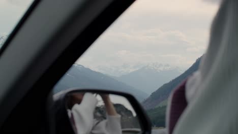 mountain scenery viewed from a car window