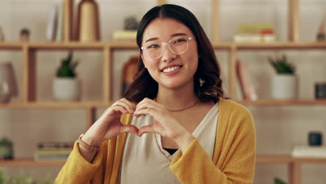 office, portrait of asian woman with heart hand