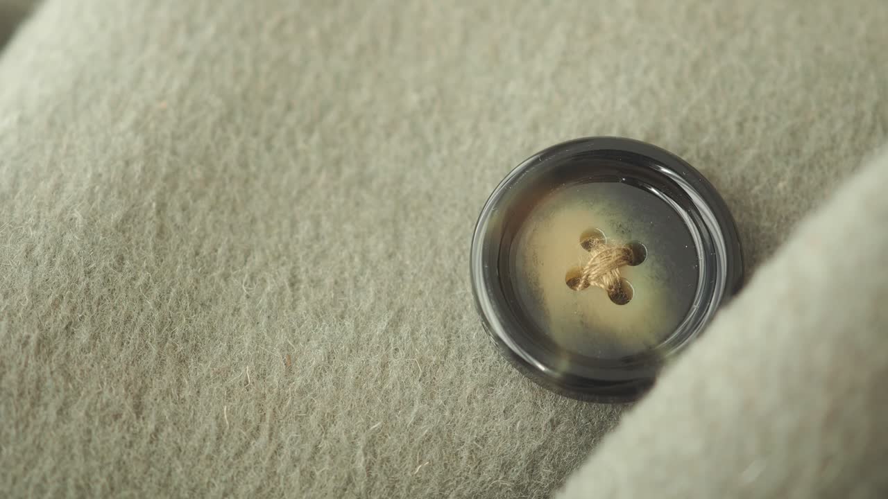 Close-up of a button on fabric