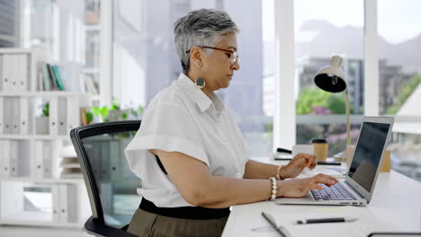 business, woman and laptop typing at desk