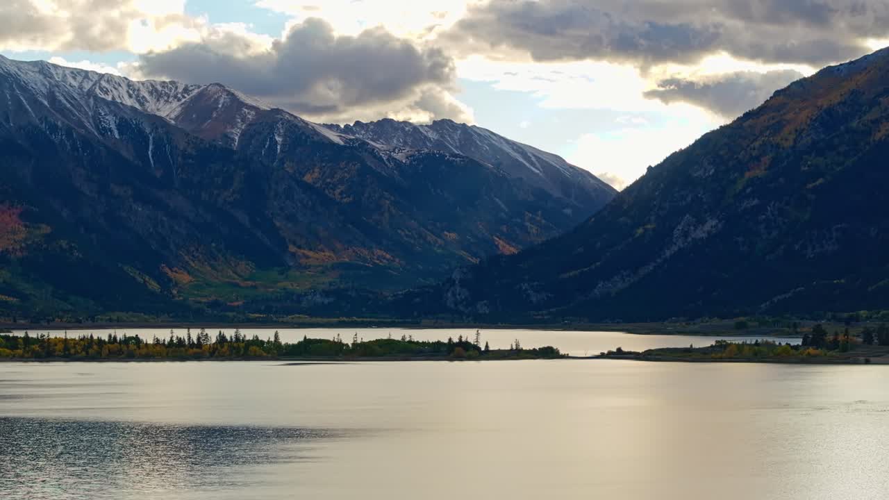 Drone footage capturing the winding roads and rugged peaks of the Colorado Rockies in Independence Pass