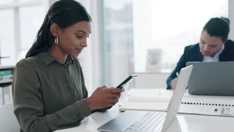 Phone,-laptop-and-a-business-woman-in-the-office