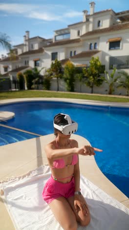 woman wearing vr headset by a pool