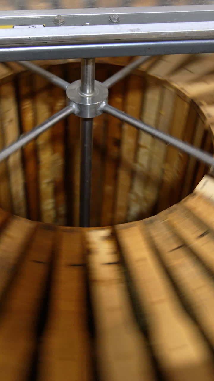 Honey farming equipment. Beekeeping apiary machine. Vertical video