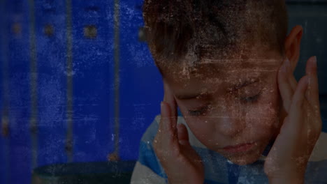 niño estresado masajeando sus templos en la escuela contra un fondo parpadeante