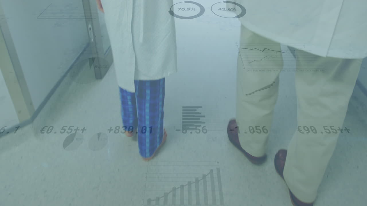 백인 남성 의사와 소년이 손을 잡고 병원에서 는 데이터 처리의 애니메이션