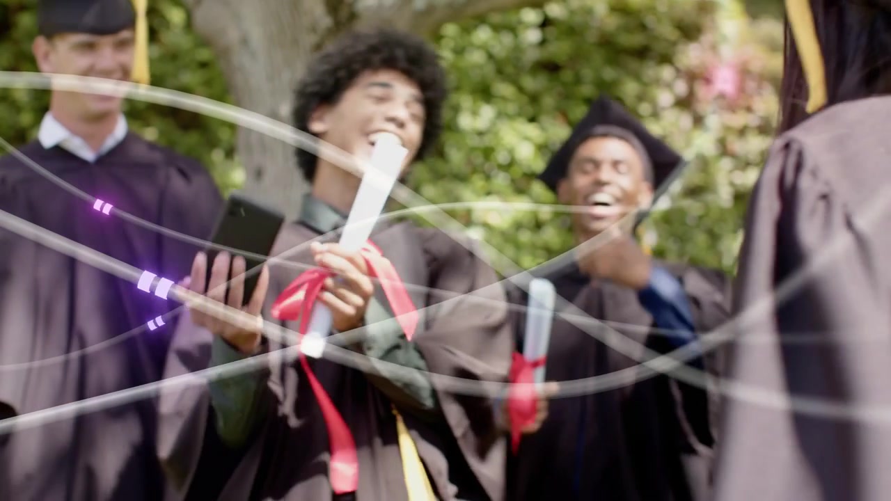 Grad extending arm for selfie with diploma, peers celebrating graduation as streaks crossing frame