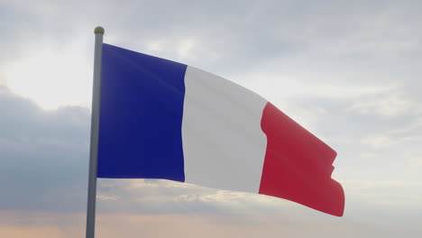 the france flag waving in the wind.