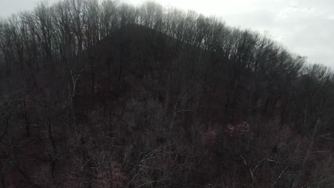 fpv mountain top foggy and dive down