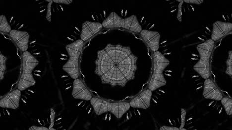 vj loop: caleidoscopio brillante y giratorio que crea patrones geométricos aleatorios en blanco