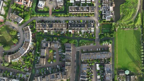 Eco-friendly-housing-project-in-Amsterdam-by-canals,-bird’s-eye-view