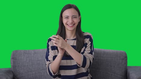 Happy-Indian-girl-doing-clapping-and-appreciating-Green-screen