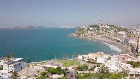 aerial drone dolly shot above coast shore city mazatlan, sinaloa, mexico with sea ocean view