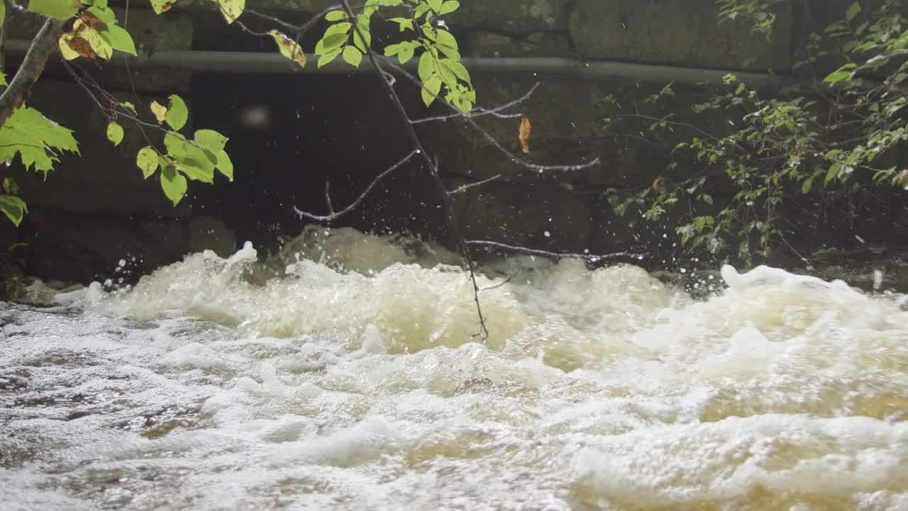 Turbulent flow of stormwater from drain pipe