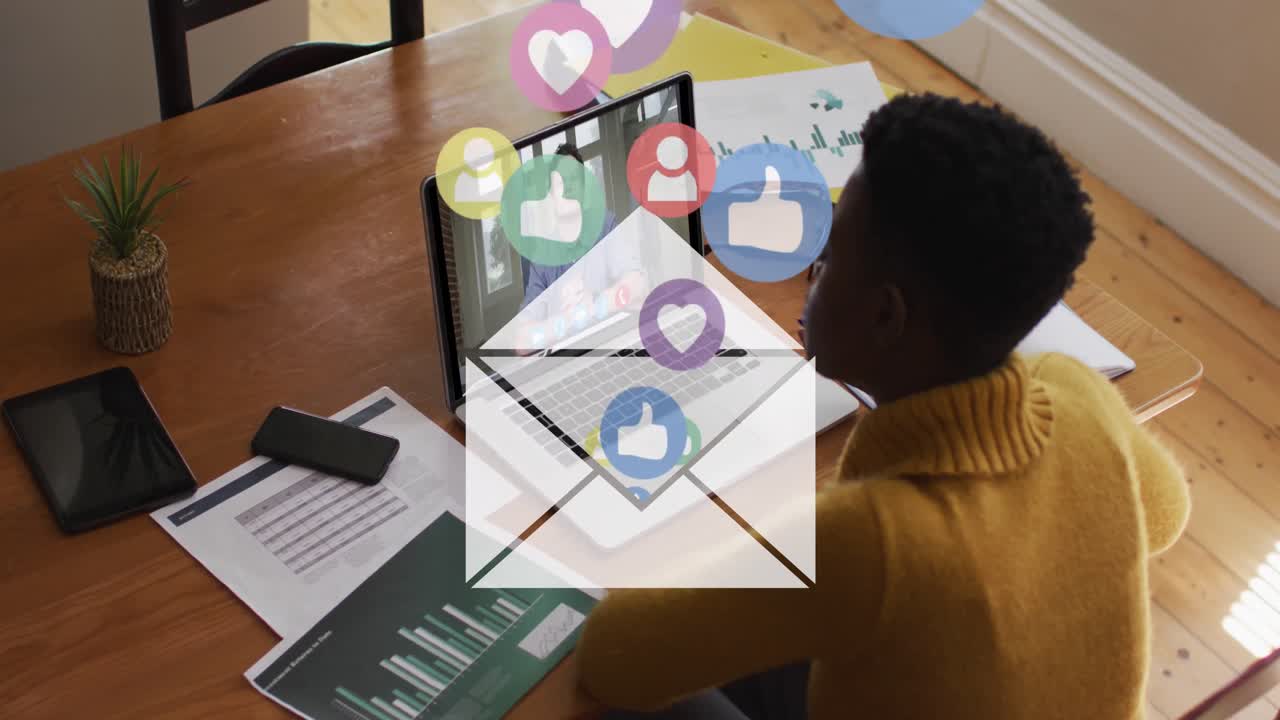 Animation of social media icons data processing over african american woman on laptop video call