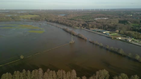 farm fields inundated in flood water in emsland, lower saxony, germany