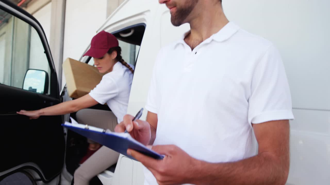 Woman courier stepping from van with package, man checking manifest, map overlay confirming route