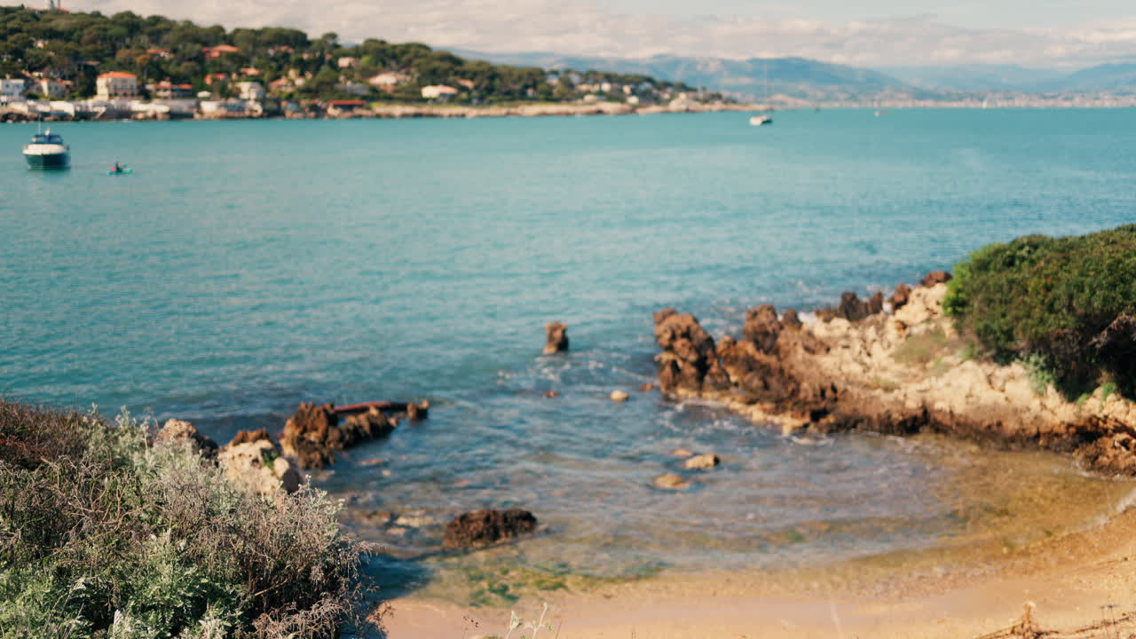 Waves crashing on the shore in a secluded spot in Bandol, France
