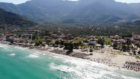 Beautiful-drone-aerial-Beach-from-Thassos-Grece-Crowded-Mountain